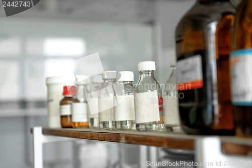 Image of old laboratory with a lot of bottles