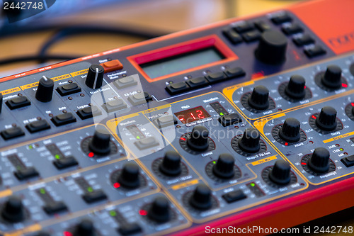 Image of Closeup photo of an audio mixer