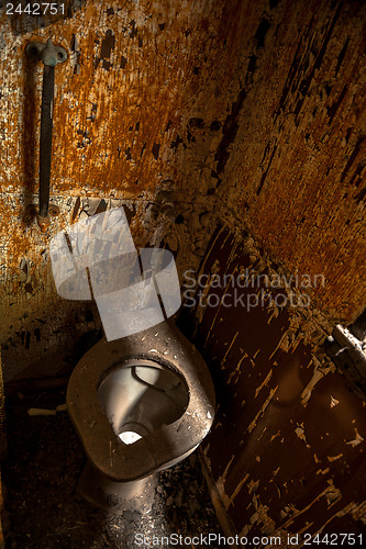 Image of Used abandoned toilette in grungy room