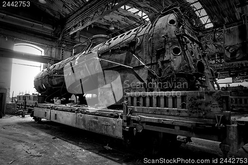 Image of Old industrial locomotive in the garage