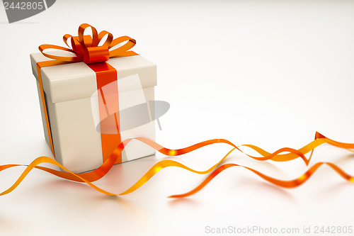 Image of gift box with red ribbon