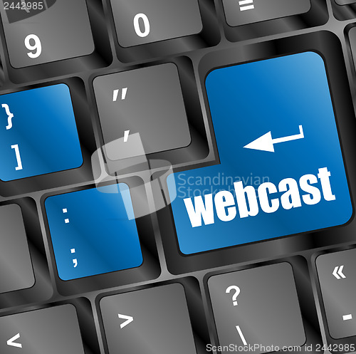 Image of keyboard with blue webcast button