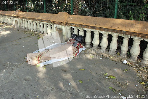 Image of Homeless people sleeping on the footpath of Kolkata