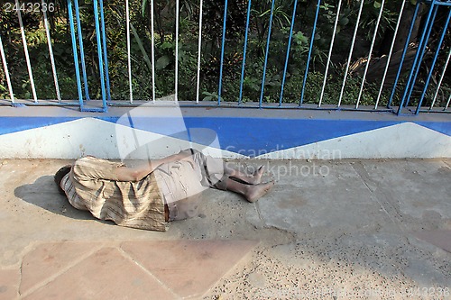 Image of Homeless people sleeping on the footpath of Kolkata