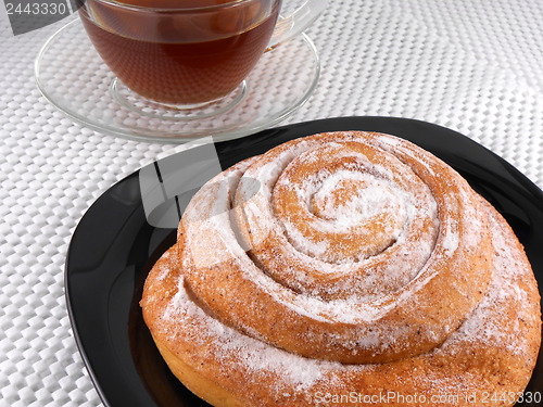 Image of Toasted cakes and tea cup