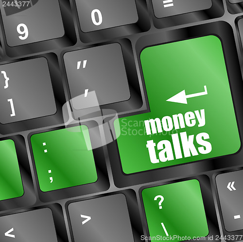 Image of money talks on computer keyboard key button