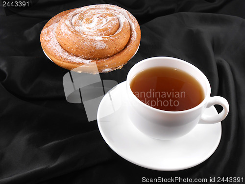 Image of cup of tea or coffee with sweet cake