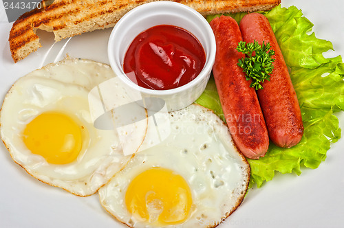 Image of Fried eggs with sausages