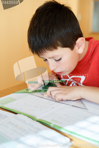 Image of boy doing school homework