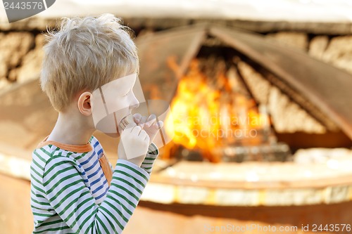 Image of boy eating smores