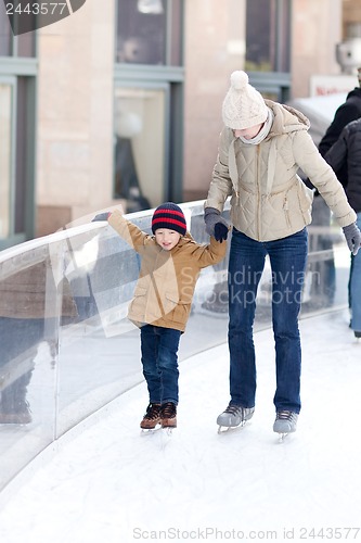 Image of family skating