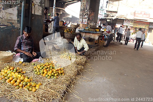 Image of Seller sells fruits on the outdoor market, Kolkata