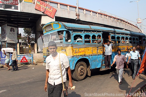 Image of People on the move come in the colorful bus, Kolkata