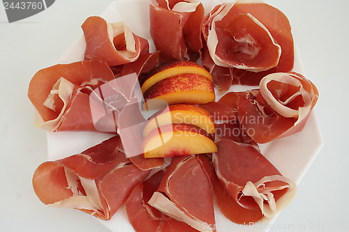 Image of Spanish Serrano ham and nectarine