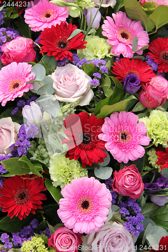 Image of Wedding arrangement in red, purple and pink