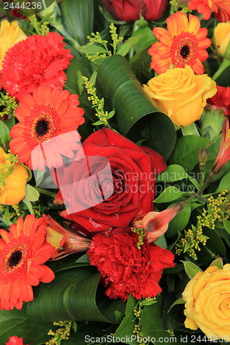 Image of Red, yellow and orange wedding decorations