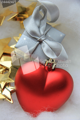 Image of Christmas gift and decorations, red heart