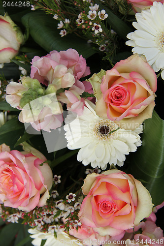 Image of pink roses and white gerberas in bridal arrangement