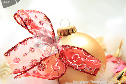 Image of Christmas decorations in red and gold