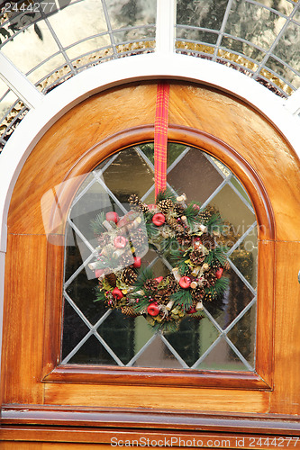 Image of Stained glass window with a wreath