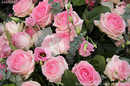 Image of Pink wedding centerpiece: roses and eustoma