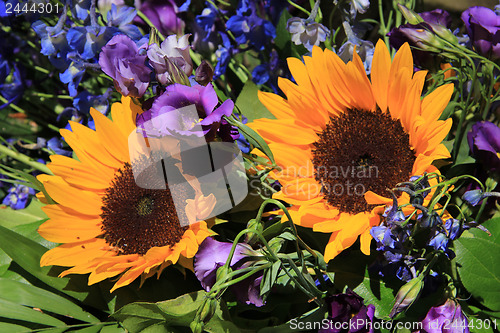 Image of Sunflowers and purple eustoma