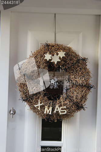 Image of Modern door with christmas wreath