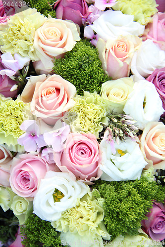 Image of purple, pink and white wedding centerpiece