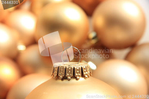 Image of Golden Christmas ornament, soft focus
