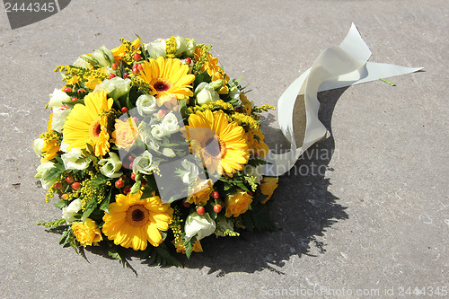 Image of Yellow sympathy flowers