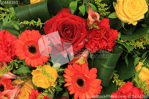 Image of Red, yellow and orange wedding decorations