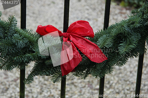 Image of Red bow on a garland