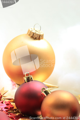 Image of Christmas decorations in red and gold