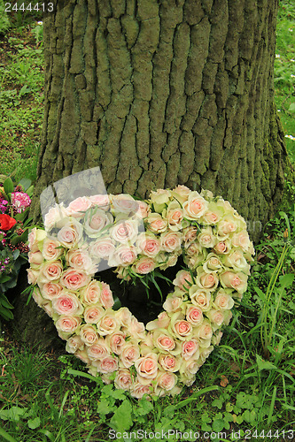 Image of Heart shaped sympathy flowers