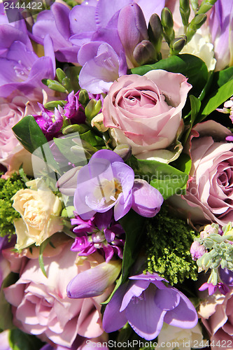 Image of Bridal bouquet in various shades of purple