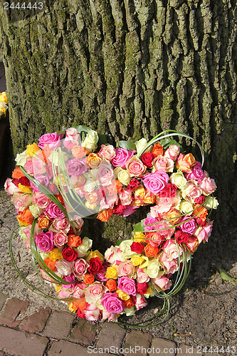 Image of Heart shaped sympathy flowers