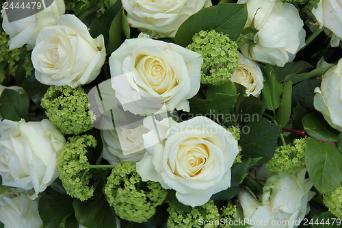 Image of White and green wedding arrangement
