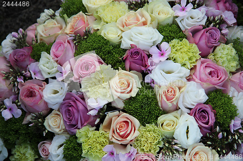 Image of purple, pink and white wedding centerpiece