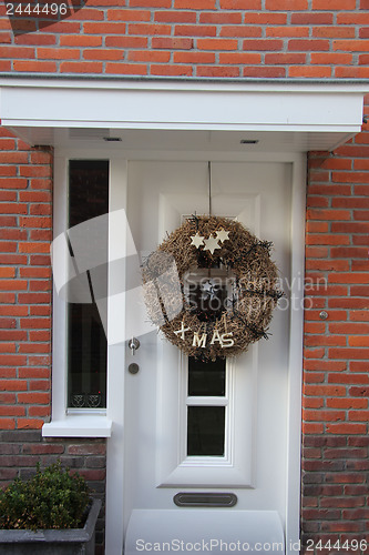 Image of Modern door with christmas wreath