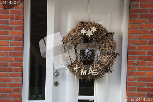 Image of Modern door with christmas wreath