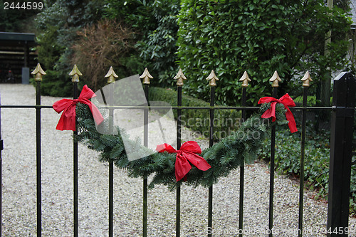 Image of Garland on a fence