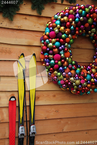 Image of Log cabin with christmas decorations