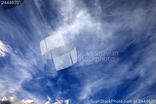 Image of Sunny sky with clouds in summer day