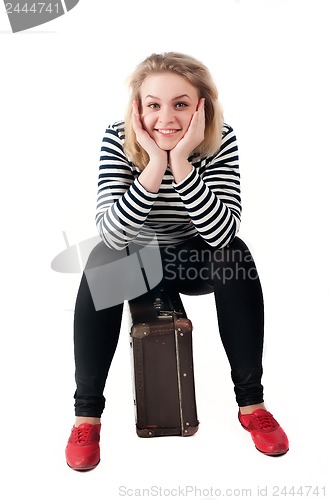 Image of Pretty woman with suitcase