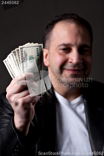 Image of Man Holding Cash