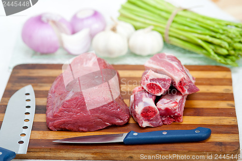 Image of raw beef and pork ribs