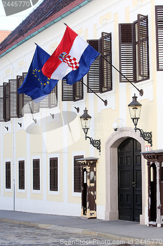 Image of Government building, EU and Croatian flags