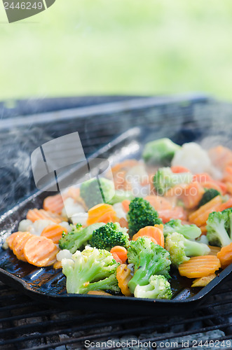Image of Vegetables fried on coals, close up
