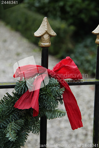 Image of Red bow on a garland