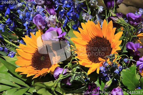 Image of Sunflowers and purple eustoma